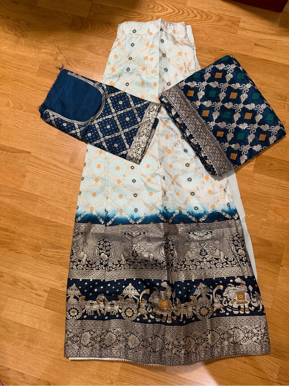 Unstitched lengha can be made small, medium, or large